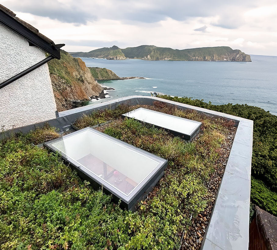 Astroglaze Flat Fixed Laminated Glass Rooflight shown on a roof
